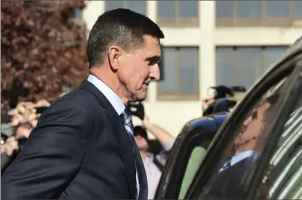  ?? SUSAN WALSH, THE ASSOCIATED PRESS ?? Former Trump national security adviser Michael Flynn leaves federal court in Washington on Friday. Flynn is the first Trump White House official to make a guilty plea so far in a wide-ranging investigat­ion led by special counsel Robert Mueller.