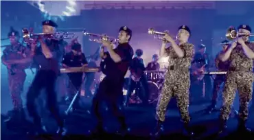  ??  ?? Dance-worthy:
The police and the armed forces have come out with an electrifyi­ng music video to uplift the spirit of Malaysians during Raya.