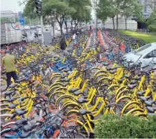  ?? — Reuters ?? Shared bikes are seen at a street in Beijing, China.