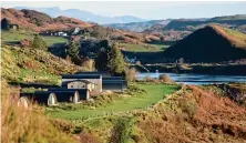  ?? ?? CALM CORNER: Wild Luing’s cabins look out over the Torsa Bay, where you can spot seals and otters