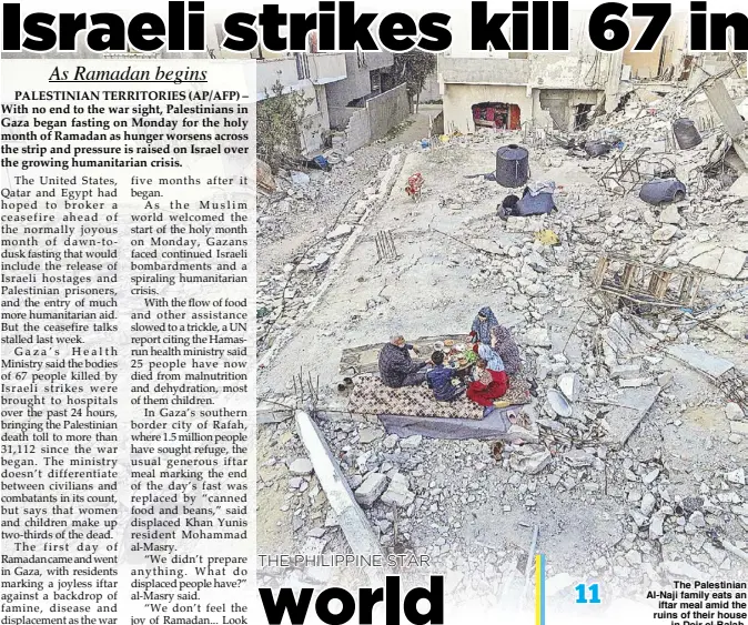  ?? AFP ?? The Palestinia­n Al-Naji family eats an iftar meal amid the ruins of their house in Deir el-Balah, central Gaza Strip on Monday.