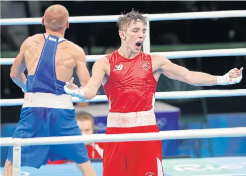  ??  ?? Ireland’s Michael Conlan gestures after losing to Vladimir Nikitin of Russia in the 56kg quarter-finals at the 2016 Rio Olympics.
