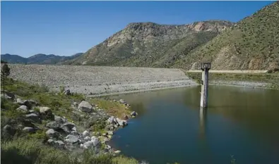  ?? GREGORY BULL/AP ?? The dam at El Capitan Reservoir in Lakeside, California. The U.S. Army Corps of Engineers is moving to offer billions in federally backed loans to fix aging dams.