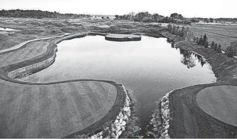  ?? PROVIDED BY EAGLE EYE GOLF CLUB ?? The par-3 17th island green at Eagle Eye Golf Club in East Lansing, Michigan, is a replica of Pete Dye’s famed design at TPC Sawgrass in Ponte Vedra Beach, Florida.