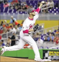  ?? WILFREDO LEE / ASSOCIATED PRESS ?? The Marlins’ Justin Nicolino delivers a pitch during the first inning against the Braves on Sunday. He allowed six hits in six innings and one earned run while striking out five.