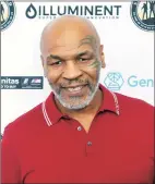  ?? Willy Sanjuan / Associated Press ?? Former world boxing champion Roy Jones Jr., left, is scheduled to fight Mike Tyson, right, in an eight- round exhibition as part of a card Nov. 28 in Los Angeles.