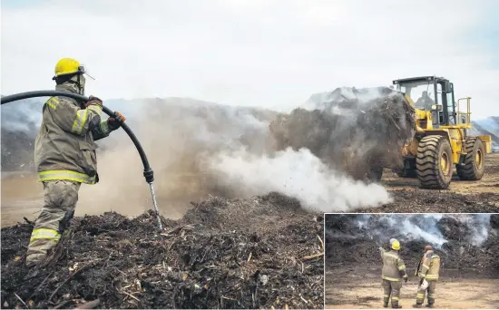  ?? Pictures: Jacques Nelles ?? SPONTANEOU­S COMBUSTION. A bulldozer clears away smoulderin­g compost at the Gartskloof landfill site in Pretoria East. INSET: Firefighte­rs at the scene.