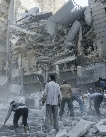  ?? KARAM AL-MASRI / AFP / GETTY IMAGES ?? The Syrian government and its Russian allies have unleashed the most destructiv­e bombing of the last five years on the city of Aleppo, in what appears to be their first all-out ground assault to retake the city from opposition forces.