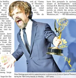  ??  ?? Peter Dinklage poses with his supporting actor in a drama series Emmy in‘Game ofThroness’ during the 70th Emmy Awards on Monday. — AFP photo