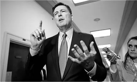  ?? J. SCOTT APPLEWHITE/AP ?? Former FBI chief James Comey speaks to reporters on Monday after his House testimony.