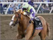  ?? GREGORY BULL — THE ASSOCIATED PRESS ?? Jose Ortiz rides Good Magic to victory in the Sentient Jet Juvenile horse race during the Breeders’ Cup, Saturday in Del Mar