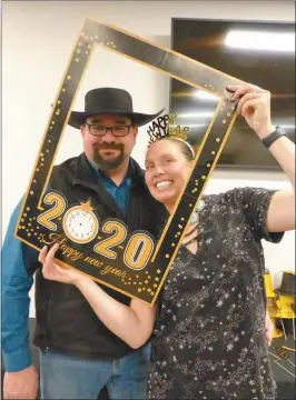  ?? Terri Licking ?? NCSA board member Kelly Kennedy and his wife Kat have some fun welcoming the New Year at the Winter Ball.