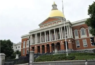  ?? BOSTON HERALD FILE ?? MAKING BANK: The workers in the Executive Office of Administra­tion and Finance at the State House in Boston pull down an average annual check of $91,000, among the highest averages in the state payroll.