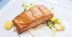  ??  ?? Fresh or canned salmon is a good source of omega 3 fatty acids and is considered a superfood.