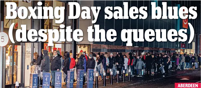  ??  ?? Bags at the ready: It was a similar story outside Next in Berryden Retail Park, where shoppers waited with clear plastic sacks hoping to fill them with bargains ABERDEEN