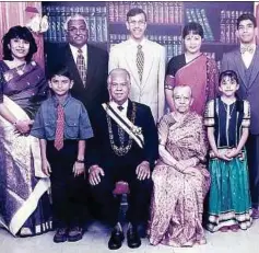  ?? ?? Dr Kannan, third from right, back row, with his family.