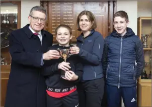  ??  ?? Cliona Walsh with her dad Kevin, mum Karen and brother Conor Walsh at her special reception in Sligo Tennis Club for her becoming the Irish U14 Girls National champion.