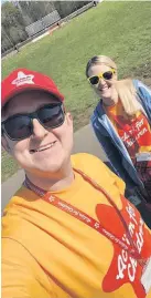  ?? Kiltwalk ?? We’ve got your back Young persons practition­er Jason Lyttle and project team leader Carla Mcguire on the