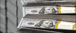  ?? LM OTERO / ASSOCIATED PRESS 2013 ?? Money — seen here at a Bureau of Engraving plant in Fort Worth, Texas — isn’t the only thing that can lead to fraught discussion­s over family inheritanc­es. Often, it’s the things that have nothing but sentimenta­l value that mean the most to surviving...