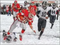  ?? DIGITAL FIRST MEDIA FILE PHOTO ?? Owen J. Roberts’ Brad Kinckner hauls in a long pass in the second half during the Thanksgivi­ng Day game in 2014. The Wildcats and Trojans will discontinu­e their Thanksgivi­ng Day rivalry in 2018, citing a multitude of reasons behind the decision.