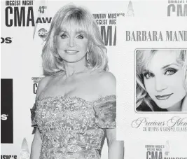  ?? GETTY/TAYLOR HILL/WIREIMAGE A360 photograph­y ?? Barbara Mandrell’s “Precious Memories: 20 Hymns & Gospel Classics” was originally released in 1989 as a two-record collection. It is now being released digitally for the first time.