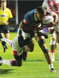  ??  ?? Fall guy: Joe Marchant scores Quins’ second try