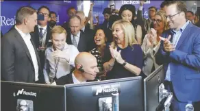  ?? Reuters ?? Julie Wainwright, CEO of The RealReal Inc., celebrates the company’s IPO pricing at the Nasdaq MarketSite in New York Friday.