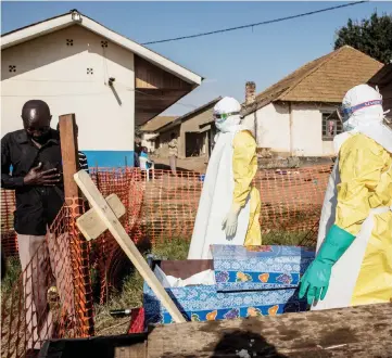  ??  ?? File photo shows a family member of a deceased, unconfirme­d Ebola patient, reacts inside an Ebola Treatment Centre run by The Alliance for Internatio­nal Medical Action (ALIMA) in Beni, Congo. — AFP photo