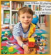  ??  ?? Oisin O’Brien (6) playing with Lego at home in Co Wicklow