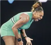  ?? — AP ?? Serena Williams reacts during her fourth round match against Simona Halep on Monday.