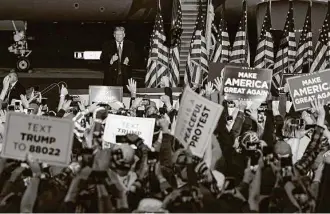  ?? Morry Gash / Associated Press ?? President Donald Trump arrives at a campaign rally Thursday at the Central Wisconsin Airport. It was his fifth visit this year to the battlegrou­nd state critical to his re-election.