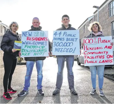  ?? PHOTO: COLIN KEEGAN, COLLINS ?? Highlighti­ng housing issues: Protesters from Dundrum Housing Action at the official opening of 44 new social houses at Rosemount Court, Dundrum, Dublin, yesterday.