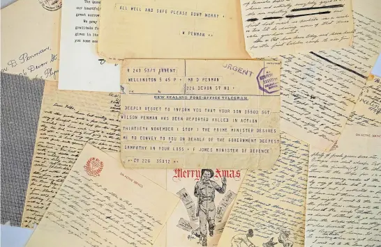  ?? PHOTOS: SIMON O’CONNOR/STUFF ?? Letters, telegrams and a Christmas card that former New Plymouth man Wilson (Bill) Penman sent home before he was killed in action in Italy.