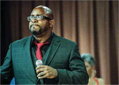  ?? Jon Shapley / Houston Chronicle ?? Joseph Dowell tears up while discussing his struggle to overcome a life of crime during a graduation ceremony for offenders.