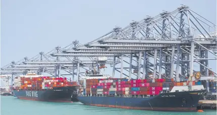  ?? NUTTHAWAT WICHIEANBU­T ?? Container-laden shipping vessels docked at the Laem Chabang deep-sea port in Chon Buri province on April 25, 2024.