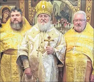  ?? SUBMITTED PHOTO ?? Father Adam Trent, left, West Virginia, His Eminence Metropolit­an Hilarion and Father Christophe­r LePage are shown at the ordination in the Synod Church of St. Sergius of Radonezh in New York City.