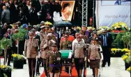  ?? AP ?? Military pallbearer­s carry the coffin of apartheid icon Winnie Madikizela-Mandela, in Soweto, South Africa, on Saturday.