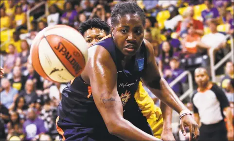  ?? Ringo H.W. Chiu / Associated Press ?? Connecticu­t Sun's Shekinna Stricklen chases the ball in Game 3 against the Los Angeles Sparks in a WNBA playoff series on Sunday in Long Beach, Calf.