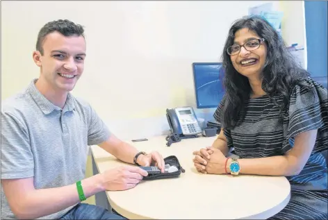  ?? CP PHOTO ?? Dr. Kaberi Dasgupta and study participan­t and co-author Michael Wright chat about blood sugar testing at the MUHC superhospi­tal in Montreal recently.