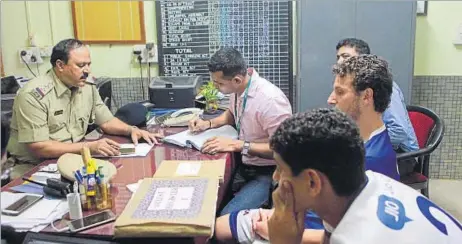  ?? PRATHAM GOKHALE/HT PHOTO ?? Elano (in blue jersey), Indian Super League’s highest-paid player, at the Margao police station following the fracas after Sunday’s final.