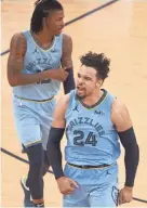  ?? JOE RONDONE/THE COMMERCIAL APPEAL ?? Grizzlies guard Dillon Brooks celebrates his 3-pointer against Utah during their May 29 playoff matchup.