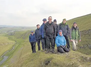  ??  ?? ●» Some of the more adventurou­s of the group scrambled up to the summit of Peter’s Stone to admire the view from this lofty perch