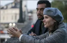  ??  ?? Felicity Jones and Nabhaan Rizwan share a scene in Netflix’s “The Last Letter From Your Lover.”