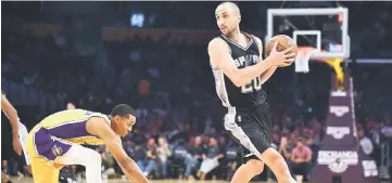  ??  ?? Manu Ginobili (right) looks to pass getting away from Jordan Clarkson of the Los Angeles Lakers in Los Angeles, California during the NBA basketball matchup in this Nov 18, 2016, file photo. — AFP photo