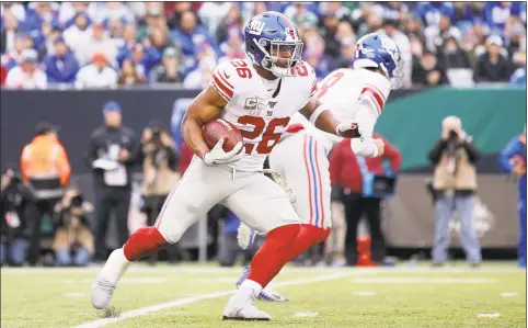  ?? Brad Penner / Associated Press ?? New York Giants running back Saquon Barkley in action against the New York Jets.