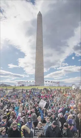  ?? Tasos Katopodis AFP/Getty Images ?? ANTIABORTI­ON activists gather for the annual March for Life in Washington. Vice President Mike Pence is the highest-ranking official to ever address the rally.