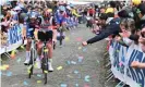  ?? ?? Van der Poel holds on to Pogacar’s wheel as fans throw confetti. Photograph: Shuttersto­ck