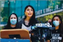  ?? RANDY VAZQUEZ — STAFF PHOTOGRAPH­ER ?? Elsa Salgado, a member of the Student Homeless Alliance at San Jose State University, speaks during a news conference held by the SJSU Human Rights Institute outside of Dr. Martin Luther King Jr. Library in downtown San Jose on June 23.