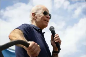  ?? CHARLIE NEIBERGALL ?? FILE - In this Aug. 8, 2019, file photo, Democratic presidenti­al candidate former Vice President Joe Biden speaks at the Des Moines Register Soapbox during a visit to the Iowa State Fair in Des Moines, Iowa. Three Democrats in their 70s are vying to challenge the oldest first-term president in U.S. history. But science says age isn’t a proxy for fitness. The bigger question is how healthy you are and how well you function. With only a few years separating them, President Donald Trump at 73has mocked Biden, 76. Biden and Sen. Bernie Sanders, 77, try to showcase physical activity on the campaign trial while 70-year-old Elizabeth Warren even jogs around at rallies.