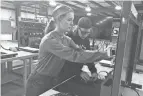  ?? JEFF BARRON/LANCASTER EAGLE-GAZETTE ?? Ohio University Lancaster engineerin­g students Abigail Hall, left, and Trevor Evans set up an electronic circuit during a basic electronic­s class at the new Fairfield County Workforce Center in Carroll.